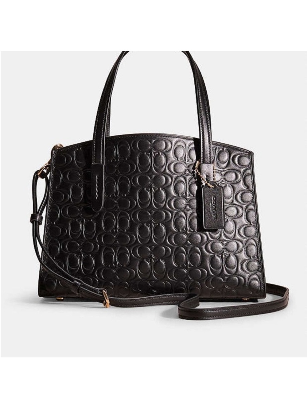 Coach Charlie Carryall 28 in Signature Leather.